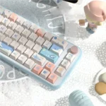 Vibrant PBT Dye-Sub Beach Summer Keycap Set, from various angles, showcases playful blues and sandy, evoking sunny beach design.