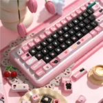 A charming set of PBT dye-sub black cat keycaps set, featuring whimsical feline designs displayed from various playful angles, highlighting their clean.