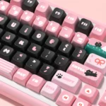 A playful collection of PBT dye-sub black cat keycaps set, showcasing their adorable whimsical designs and clean lines from various angles.