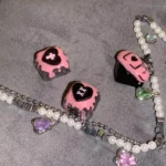 A charming, exquisitely handcrafted Blackberry Cookie Artisan Keycap from a unique angle, highlighting its intricate, food-inspired details and artistic angles.