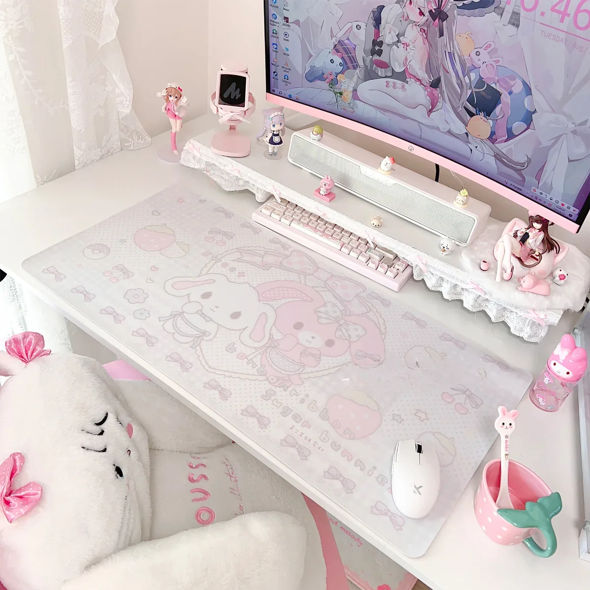 Detailed shot of the Bonbonribbon & Sugarbunnies Desk Mat, highlighting its charming pastel colors and smooth, durable material.