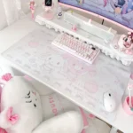Adorable Bonbonribbon & Sugarbunnies Desk Mat crafted from large PU leather, showing its playful white rabbit design and smooth texture from multiple angles.