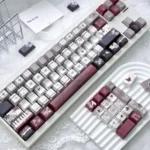 Broken Window Butterfly Cherry Keycap Set. Delicate butterflies break free, illuminated by vibrant side-lit legends. See artistic side-printed details from various angles.