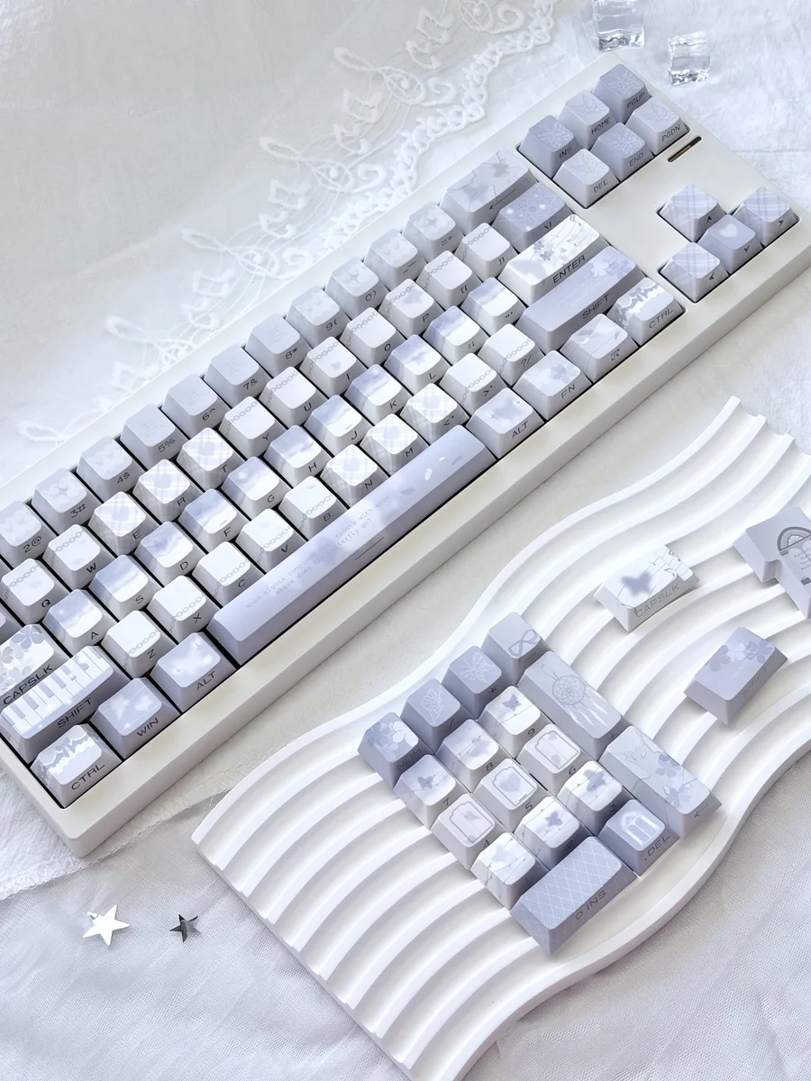 Broken Window Butterfly Cherry Keycap Set, viewed from artistic angles, highlighting delicate butterfly designs and vibrant side-lit legends breaking free.