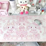 A detailed view of the extra-large pink bunny desk mat, revealing its smooth, comfortable PU texture and the whimsical, cute bunny motif for a playful design.