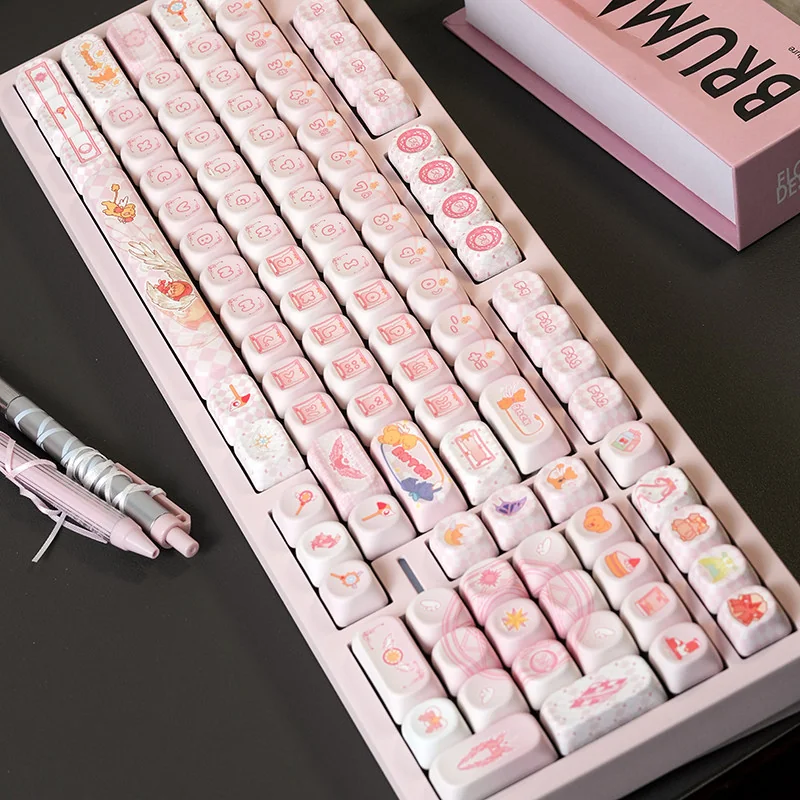 Cardcaptor Sakura PBT MOA keycaps set, featuring a magical anime aesthetic with pastel colors, stars, and iconic Sakura motifs. Elevate your keyboard now.