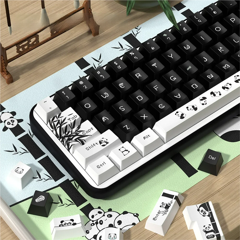 Charming panda PBT dye-sub keycaps set are playfully displayed from multiple angles, revealing their clean, minimalist black and white design for mechanical keyboard.