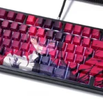 Playful Zero Two PBT dye-sublimation keycaps set gallery, featuring vibrant anime designs and iconic pink/red accents from various angles.