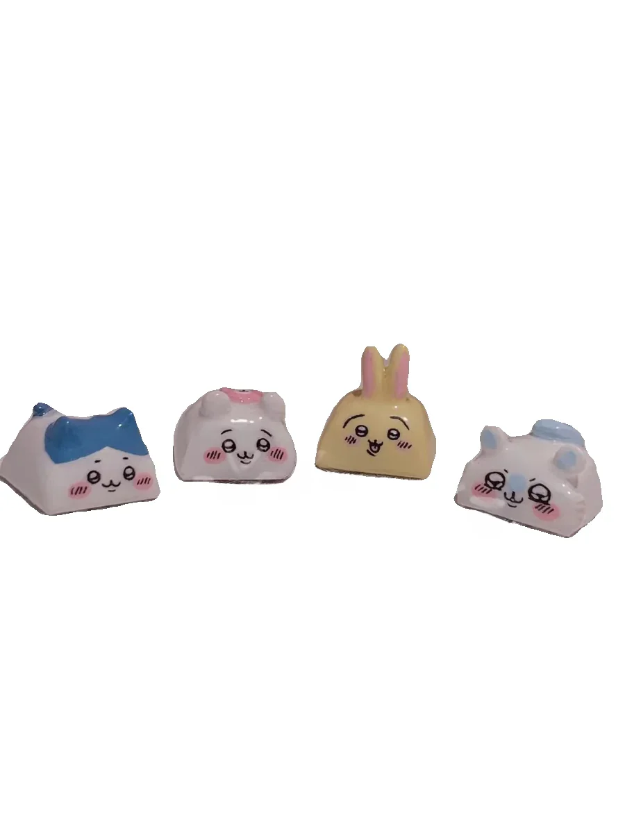 A collection of whimsical handmade resin Chiikawa artisan keycaps from various angles, showcasing their unique, meticulously sculpted designs.