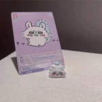 A collection of whimsical Chiikawa artisan keycaps, showcasing various handmade resin charms from different angles, highlighting their unique, playful design.