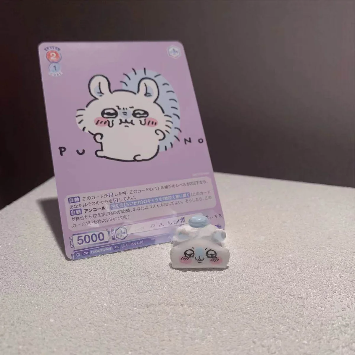 A collection of whimsical Chiikawa artisan keycaps, showcasing various handmade resin charms from different angles, highlighting their unique, playful design.