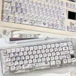 Whimsical Chiikawa keycaps set featuring adorable Momonga characters. These vibrant, side-printed, backlit-ready keycaps bring playful charm to any keyboard.