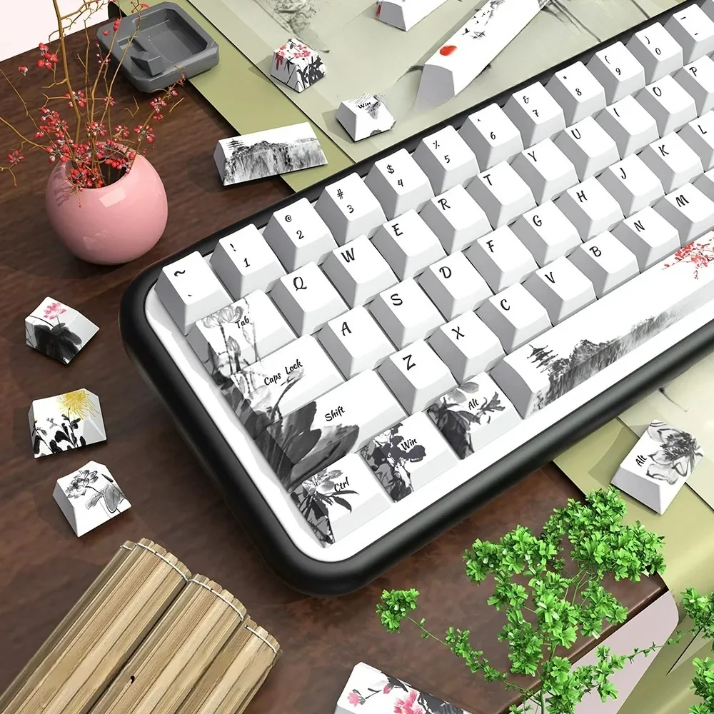 Exquisite Chinese Ink Wash PBT Keycaps Set, displaying tranquil ink landscapes and elegant calligraphy on durable PBT, captured from multiple angles.