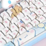 Close-up of the adorable Cinnamoroll PBT dye-sublimated keycaps set, showcasing the charming white and blue whimsical character design from a different angles.