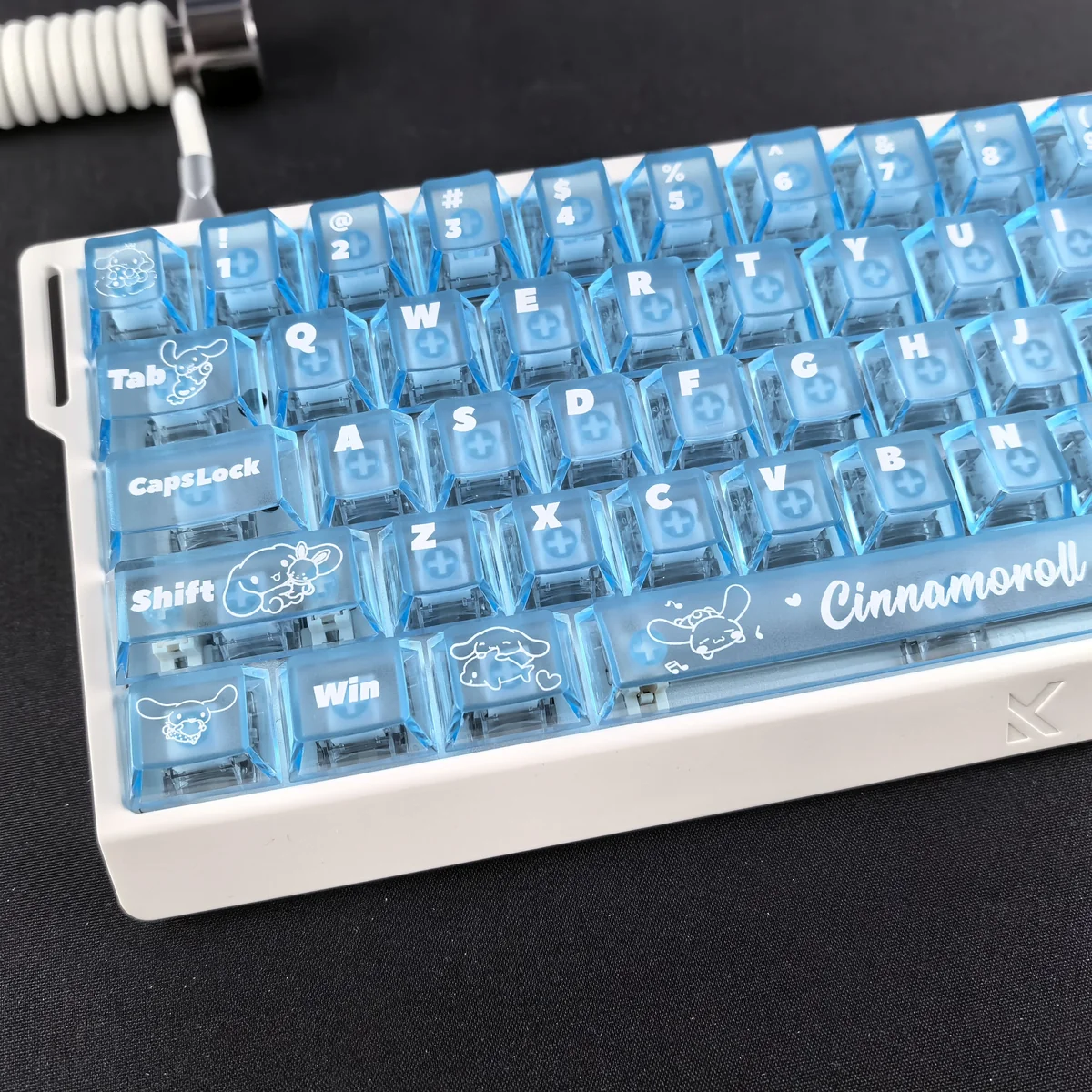 Dreamy Cinnamoroll translucent PC keycaps set in blue mist, glowing beautifully from multiple angles, perfect for captivating backlighting.