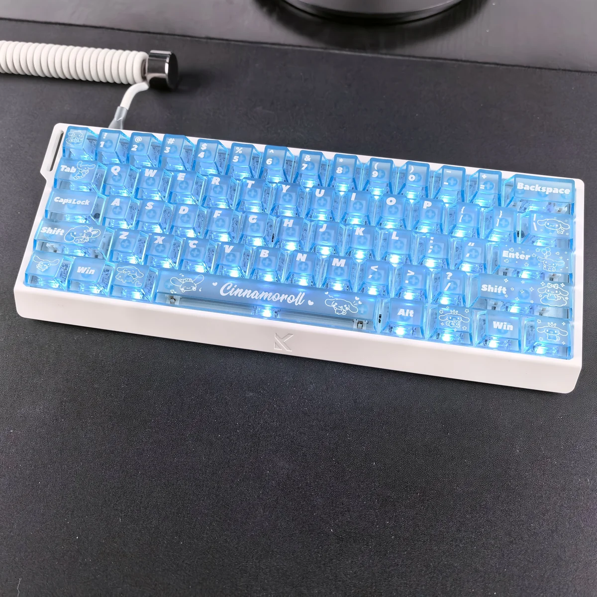 Playful gallery views of adorable Cinnamoroll translucent PC keycaps set, highlighting their dreamy blue mist aesthetic and captivating backlighting.