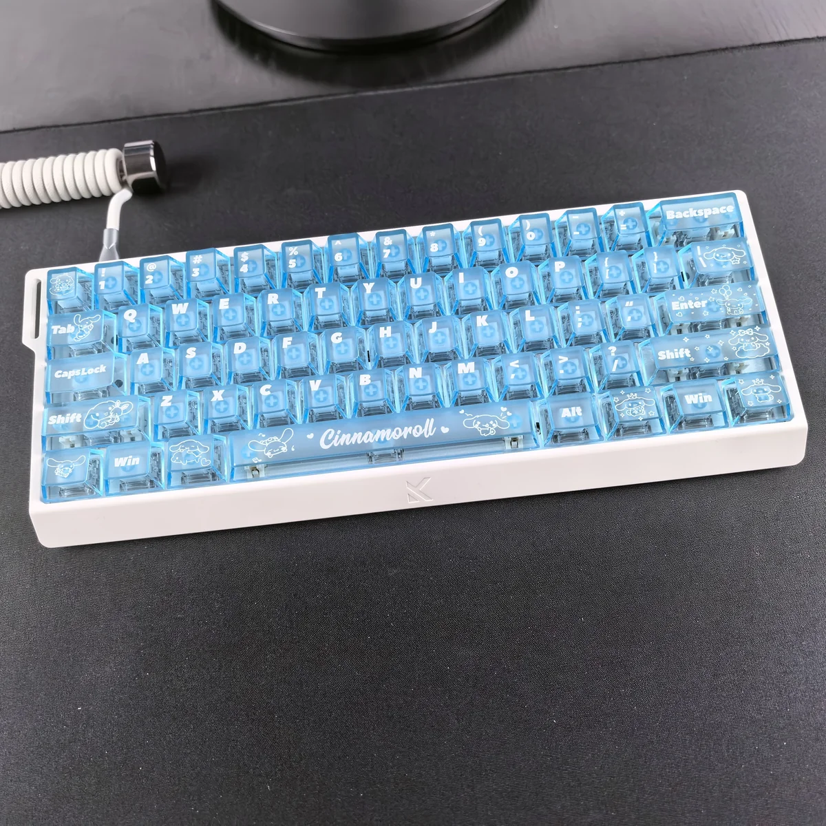 Adorable Cinnamoroll translucent PC keycaps set in a dreamy blue mist, perfect for captivating backlighting and a playful keyboard look.