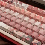 Intimate view of custom Closer Heart Series Keycap Set, highlighting subtle translucent pink and white designs for a personalized keyboard aesthetics.