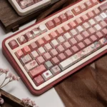 Close-up of a translucent custom heart keycap from the Closer Heart Series Keycap Set, showcasing its intricate design and soft, intimate aesthetic.