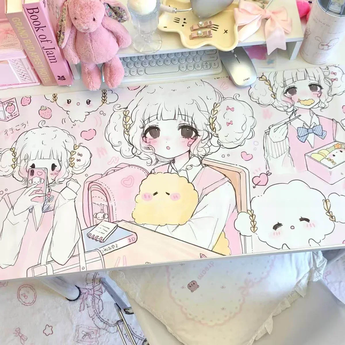 Whimsical Cogimyun desk mat, viewed from a new angle, displaying its charming character design, soft pastel hues, and premium PU for joyful desk protection.