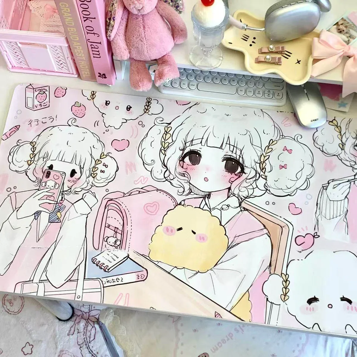 Close-up of the whimsical Cogimyun desk mat, highlighting its soft pastel hues and premium PU material, offering dreamy, spacious desk protection.