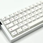 Vibrant colorful PBT keycaps set shown from multiple playful angles, offering a dynamic spectrum for personalized custom keyboards, enhancing their modern design.