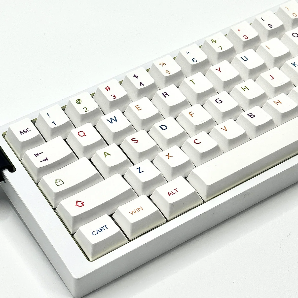 Vibrant colorful PBT keycaps set shown from multiple playful angles, offering a dynamic spectrum for personalized custom keyboards, enhancing their modern design.