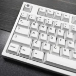 Monochromatic Cosmic PBT Keycaps Set displayed from a unique angle, revealing the durable PBT and elegant monochromatic cosmic design, evoking celestial wonder design.