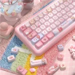 Dreamy Cotton Candy PBT Keycaps Set from multiple angles, highlighting durable PBT, soft pastel hues, ethereal clouds, and sweet candy designs.
