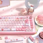 Playful PBT Dreamy Cotton Candy Keycaps set from various angles, showcasing soft pastel colors, ethereal cloud motifs, and durable design.