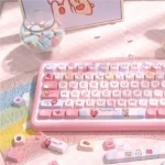 Dreamy Cotton Candy PBT Keycaps set, showcasing soft pastel hues and ethereal cloud design from various angles. Durable and playfully sweet.