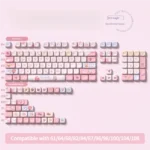 Playful close-up of durable PBT Cotton Candy Keycaps Set, revealing their dreamy pastel pink swirls, like sweet ethereal clouds.