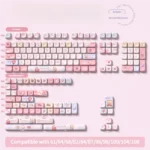 Dreamy cotton candy PBT keycaps set: a 158-key set, SCA height, in a box. Features soft pastel colors for a sweet, playful aesthetic and durable quality.
