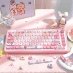Dreamy Cotton Candy PBT Keycaps set showcasing soft pastel hues, resembling fluffy clouds and sweet treats. Durable and playful aesthetic for your keyboard.