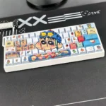 Playful Crayon Shin-chan backlit PBT keycaps set, with iconic anime characters. Side-printed designs glow vibrantly from various angles, emphasizing durability design.