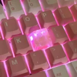 Close-up of a vibrant, translucent handmade Crushed Ice Keycap, highlighting its refreshing texture and sparkling crystal filling, perfect for a playful setup.