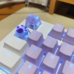 A collection of vibrant, translucent handmade Crushed Ice Keycaps, showcasing their sparkling crystal filling and refreshing summer treat texture.