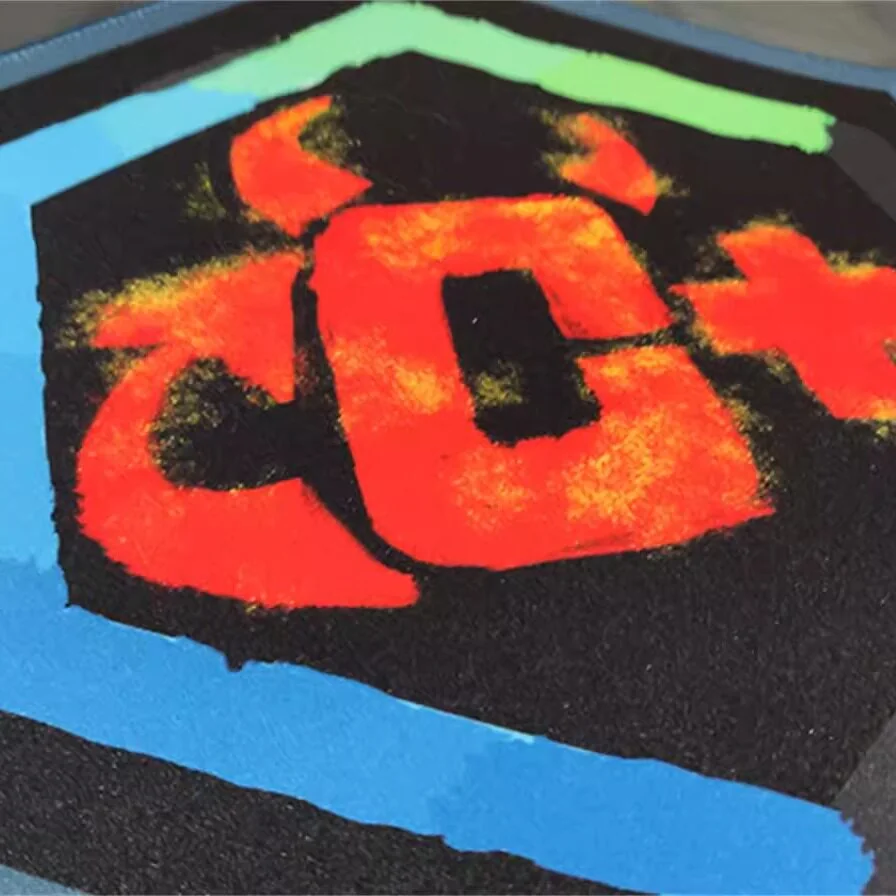 Artistic CS2 themed irregular gaming mousepad showcasing its unique shape and dynamic in-game elements from a distinct angle, enhancing any gaming setup.