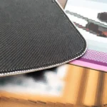 Experience the golden drop unboxing thrill with this vibrant pixel art CSGO mousepad, vividly displayed from a captivating side angle, showcasing its gaming design.