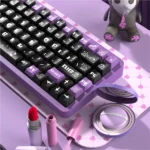 A close-up view of the mischievous Dark Devil PBT keycaps set, showcasing various playful devil motifs and gothic-inspired details from a unique angle.