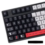 Death Note PBT dye-sub keycap set, displaying an enigmatic L character close-up from an artistic, dark angle, highlighting the durable, iconic anime design.