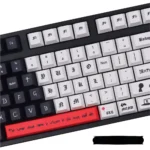 Artistic gallery shot of Death Note PBT dye-sub keycaps set, revealing iconic symbols and characters from multiple perspectives, emphasizing the durable.