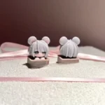 Handcrafted Delta Force Hackclaw artisan keycap, showcasing its vibrant, stylized mouse character and intricate gaming art from a distinct perspective angles.