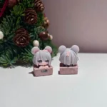 Handcrafted Delta Force Hackclaw artisan keycap, from a unique angle, highlighting the stylized mouse character's vibrant, intricate details. A gaming setup.