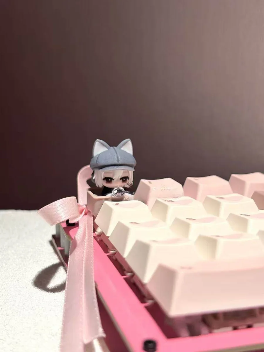 Handcrafted Delta Force Luna artisan keycap, intricately sculpted with a dark cat motif, shown from a unique angle, highlighting its premium setup.