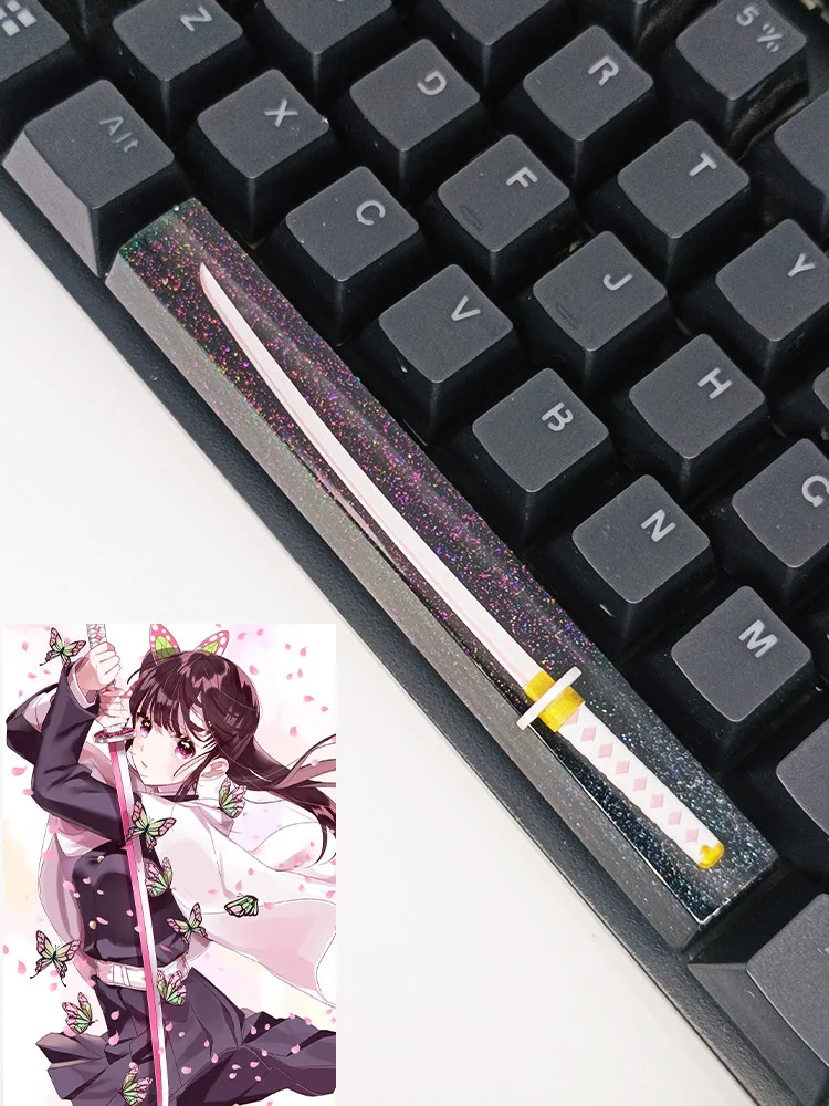 Artisan Demon Slayer RGB Spacebar Keycap featuring iconic anime characters within luminous, starry translucent resin, captured from a detailed angle.