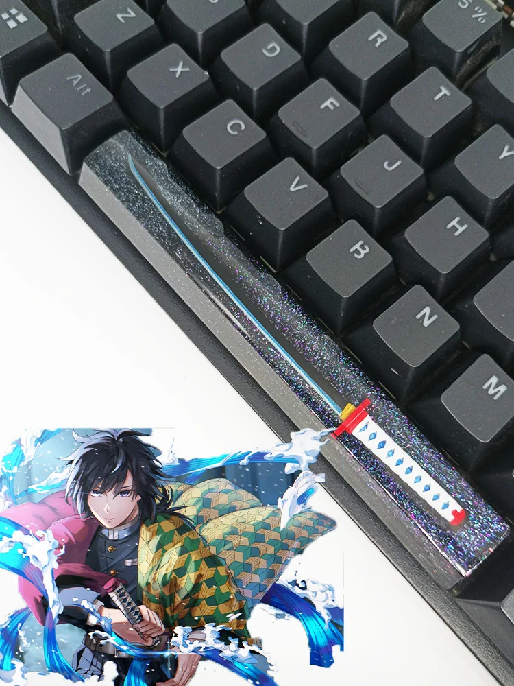 Artisan Demon Slayer RGB spacebar keycap featuring a luminous blue water pillar design, showcasing intricate anime resin craftsmanship with a translucent design.