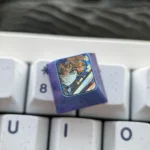Multiple angles of the premium Zenitsu Agatsuma Demon Slayer titanium art keycap, showcasing its intricate, vibrant character design and sleek, durable titanium alloy.