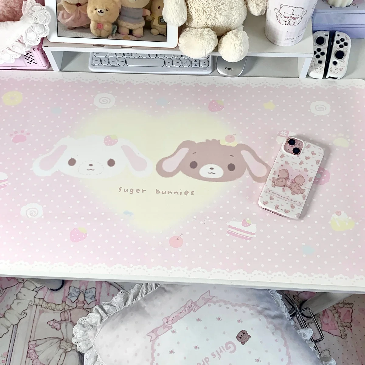 A large whimsical pastel Dessert Kurousa and Shirousa Desk Mat showcasing a charming bunny surrounded by sweet treats, creating a cozy and playful desktop aesthetics.