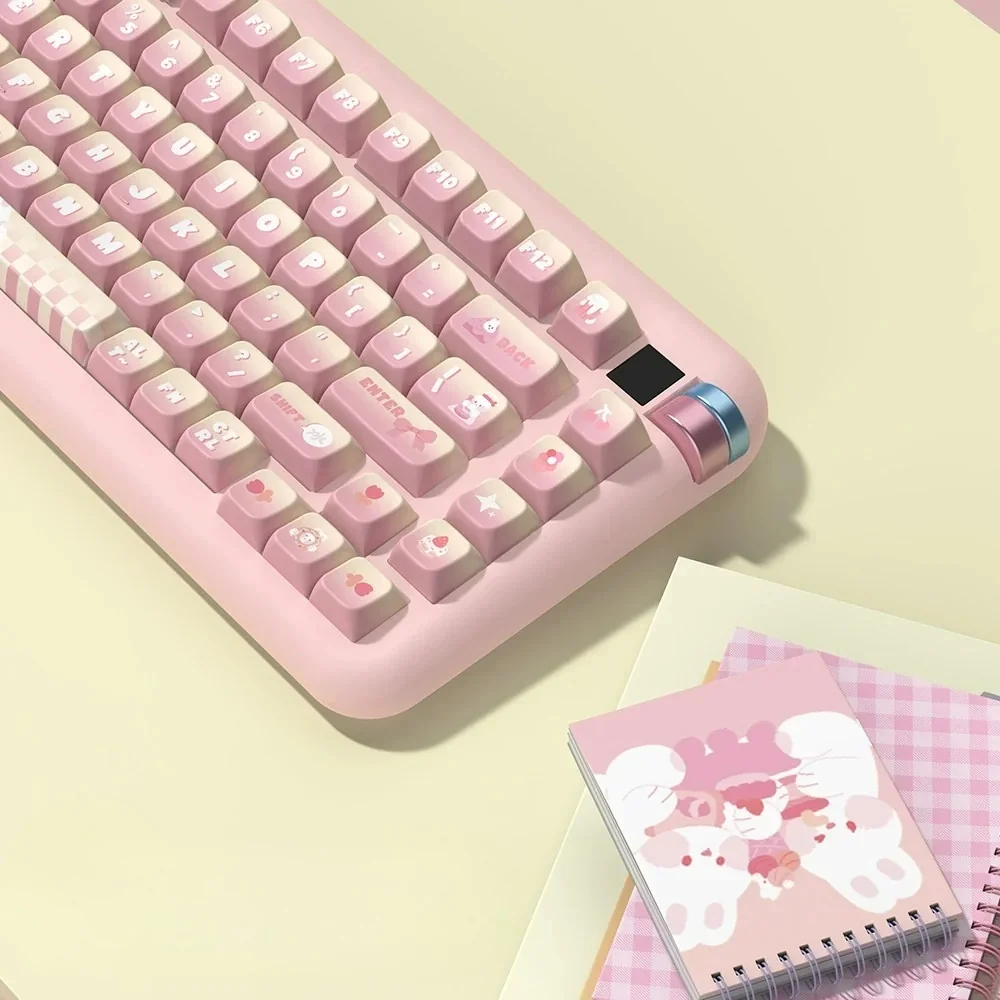 Premium PBT MDA Dessert Rabbit keycaps set from a playful angle, showcasing adorable dessert illustrations in a pastel pink and yellow gradient.